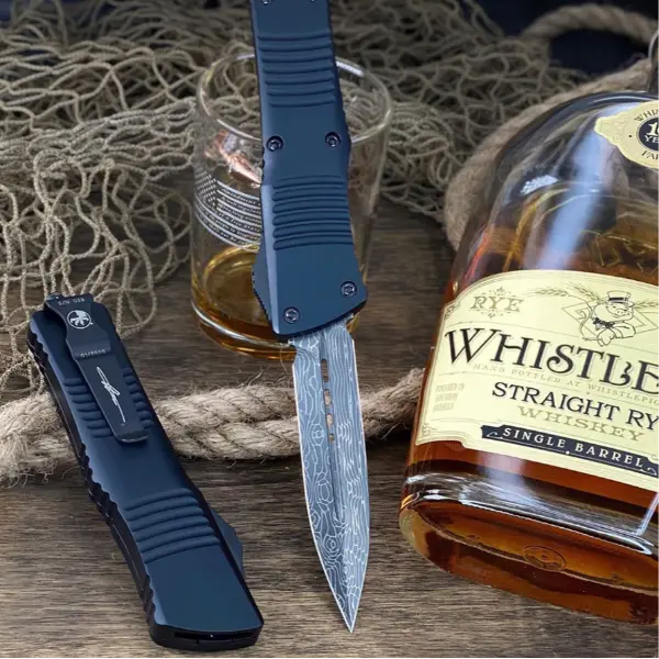 Microtech Combat Troodon D/E Signature Series Damascus Standard Ringed Hardware 142-16 S - 1